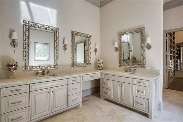 Bathroom Opulence with Double Vanity and Intricate Mirrors