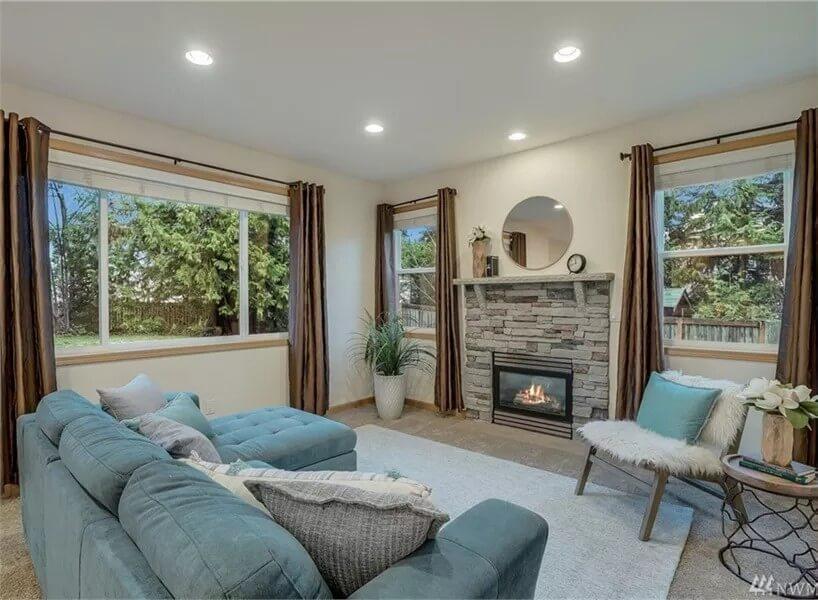Stone Fireplace Anchors This Inviting Family Room