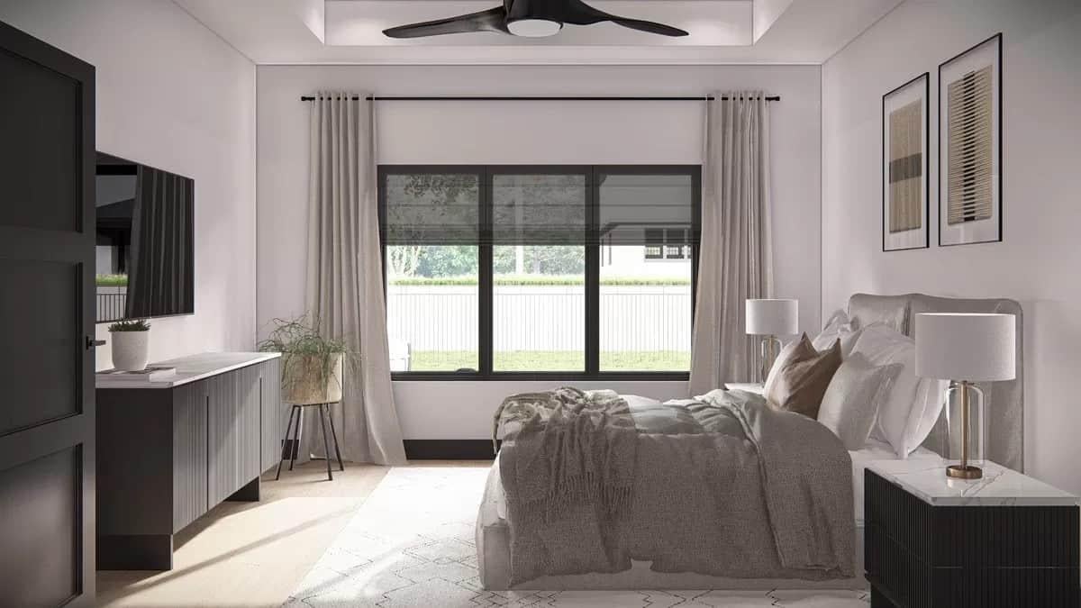 Calming Bedroom with a Modern Ceiling Fan and Plush Textures