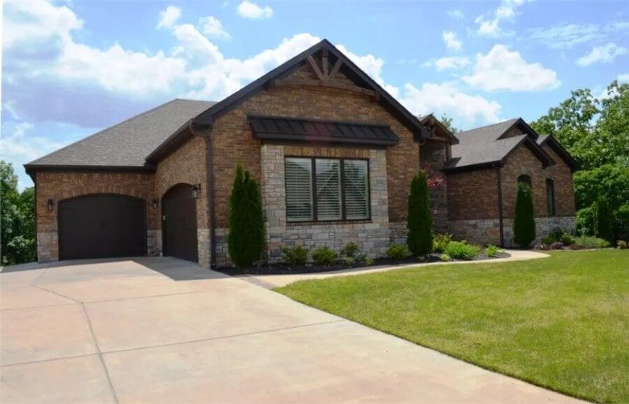Craftsman Style with Elegant Stonework and Dormers