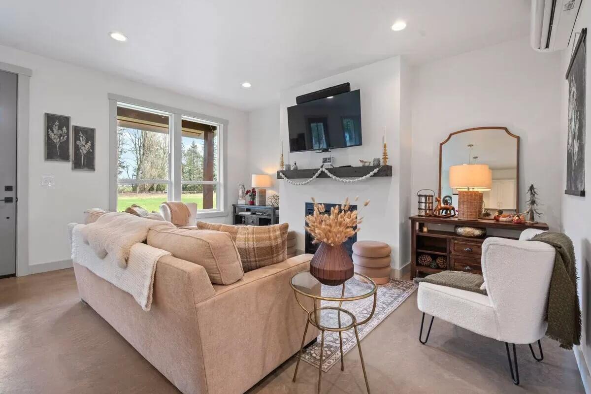 Cozy Living Room with a Sleek Wall-Mounted TV