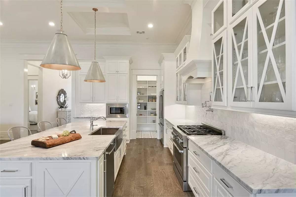 Marble Countertops and Custom Cabinetry Make This Kitchen Shine