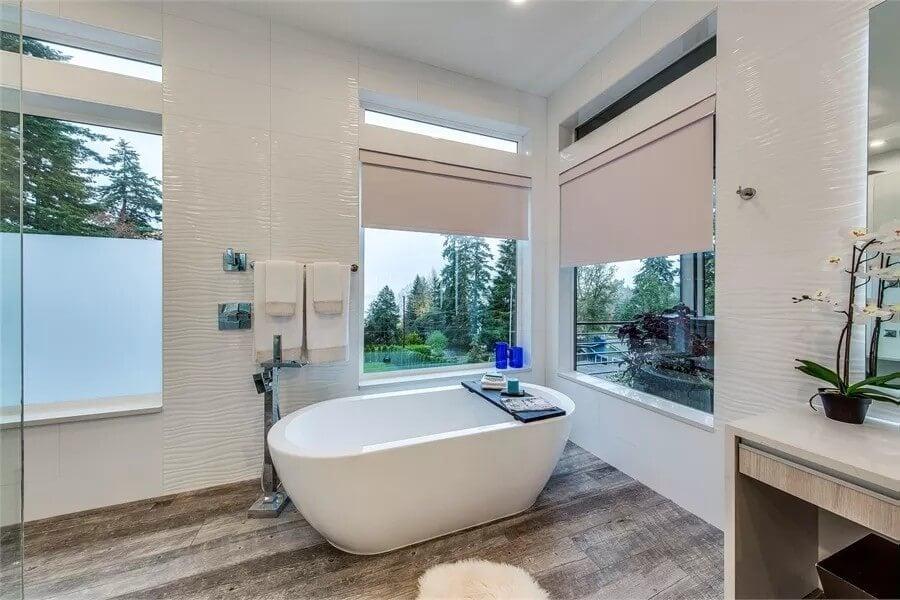 Take a Moment to Admire the Freestanding Tub Overlooking Nature