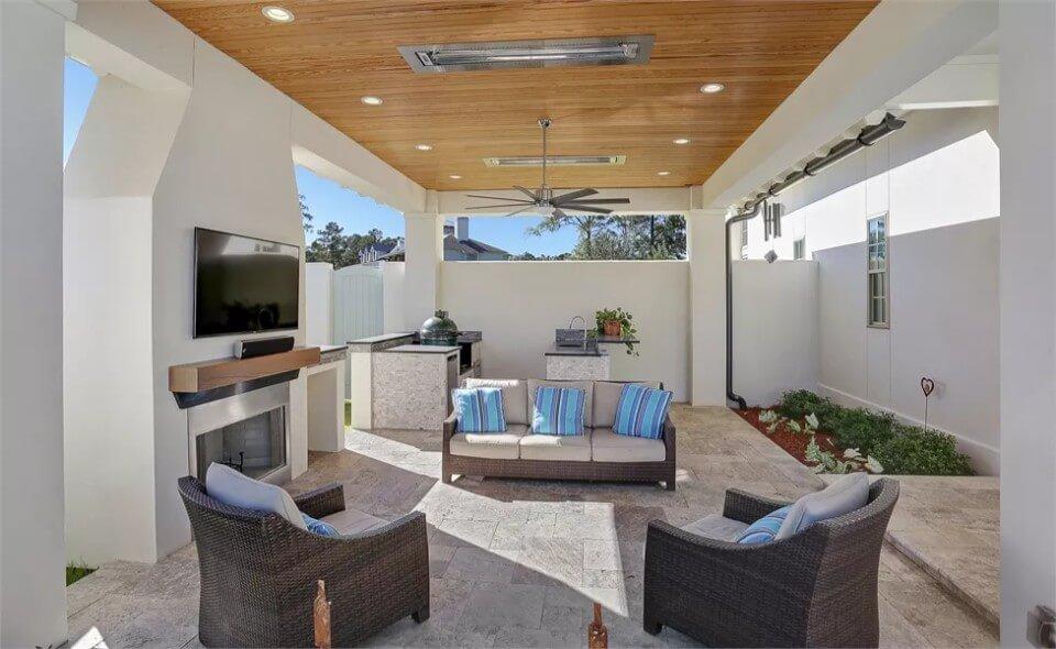 Check Out This Outdoor Retreat with a TV and Fireplace