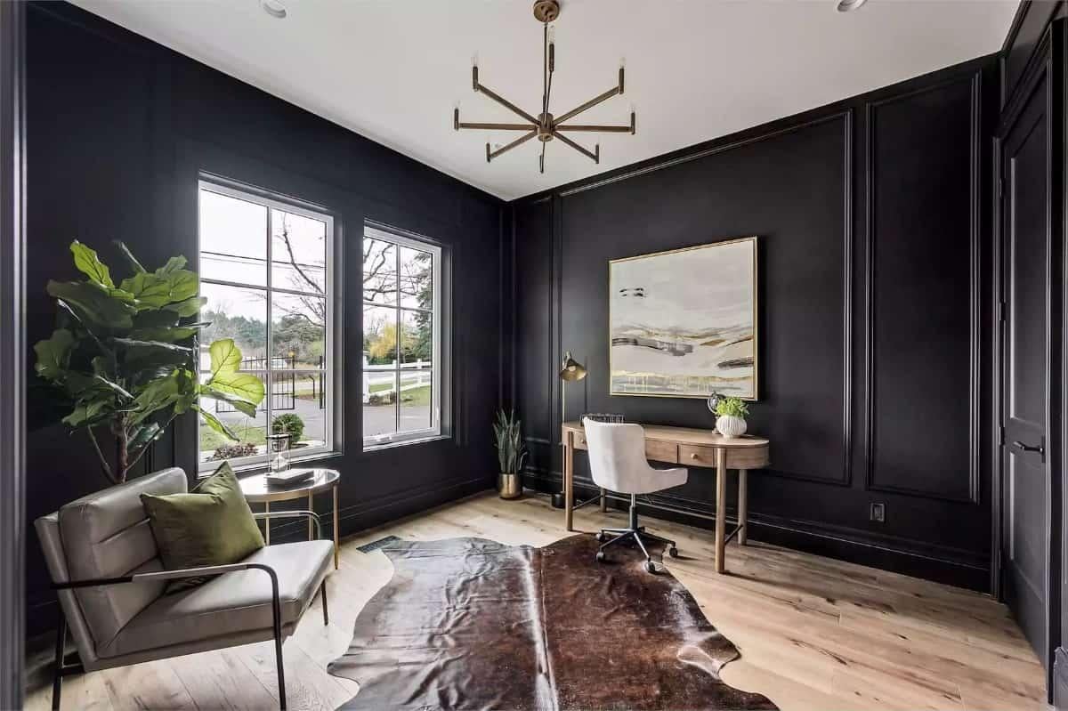 Check Out the Chic Black Walls and Modern Lighting in This Stylish Study