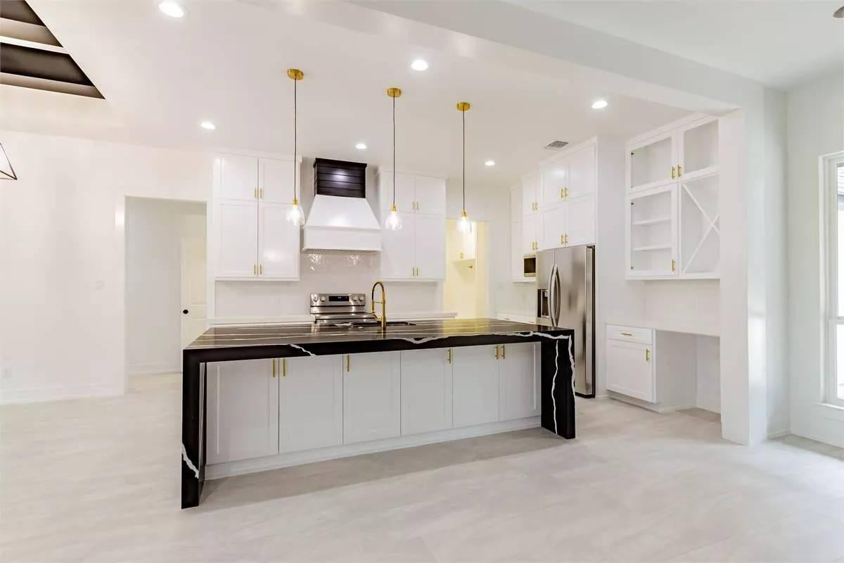 Notice the Striking Marble Island in This Modern Kitchen