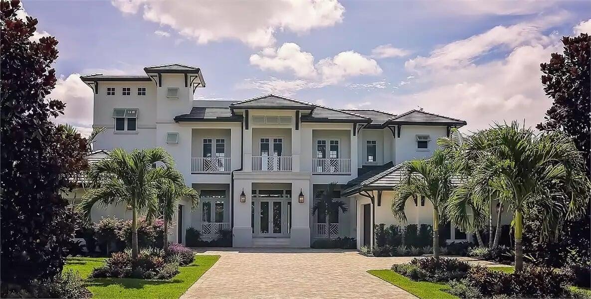 Stately Facade with Striking Symmetry and Tropical Flair