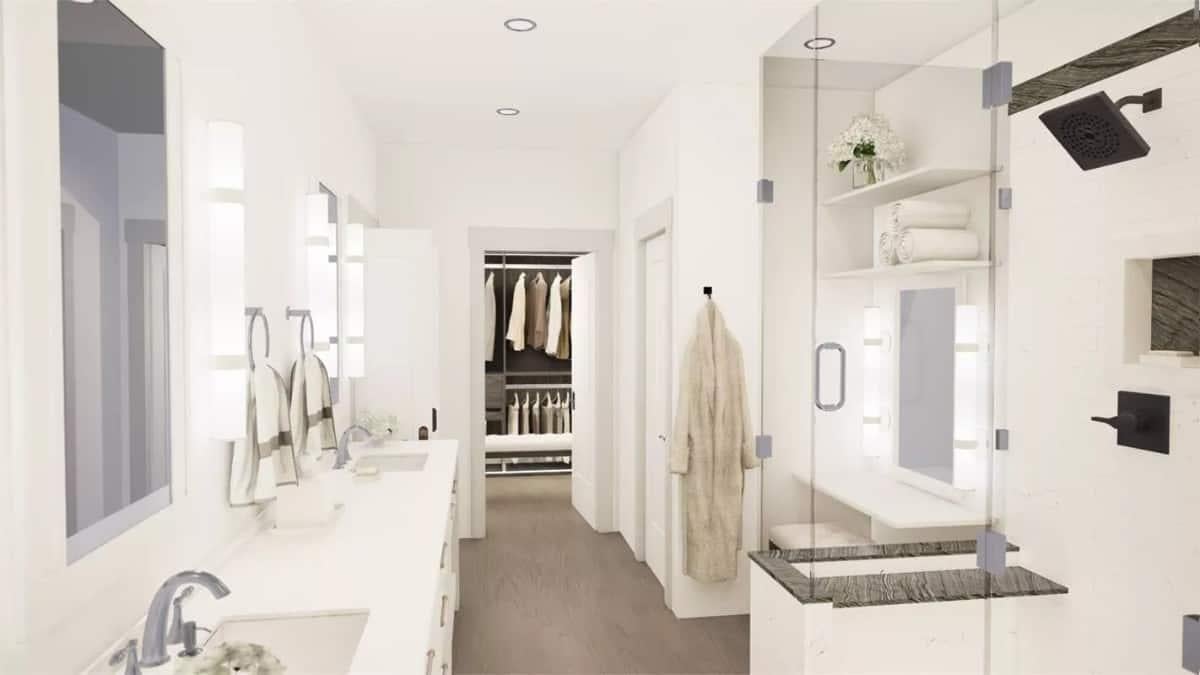 Check Out the Dual Vanities and Gleaming Glass Shower in This Modern Bathroom