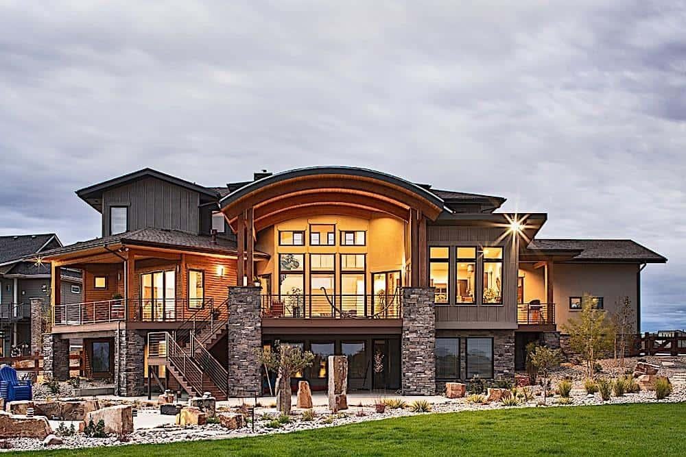 Marvel at the Expansive Deck and Exposed Beam Detailing on This Craftsman Home