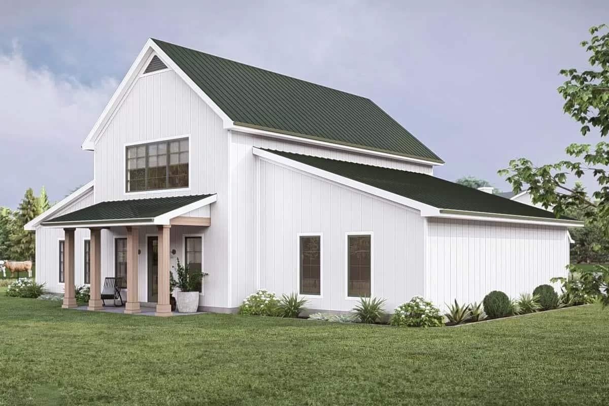 Classic Farmhouse with a Deep Green Metal Roof and Simple Porch