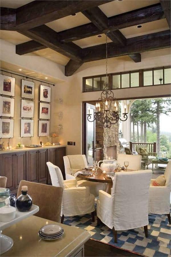 Admire the Vaulted Wood Beam Ceiling in This Inviting Dining Area