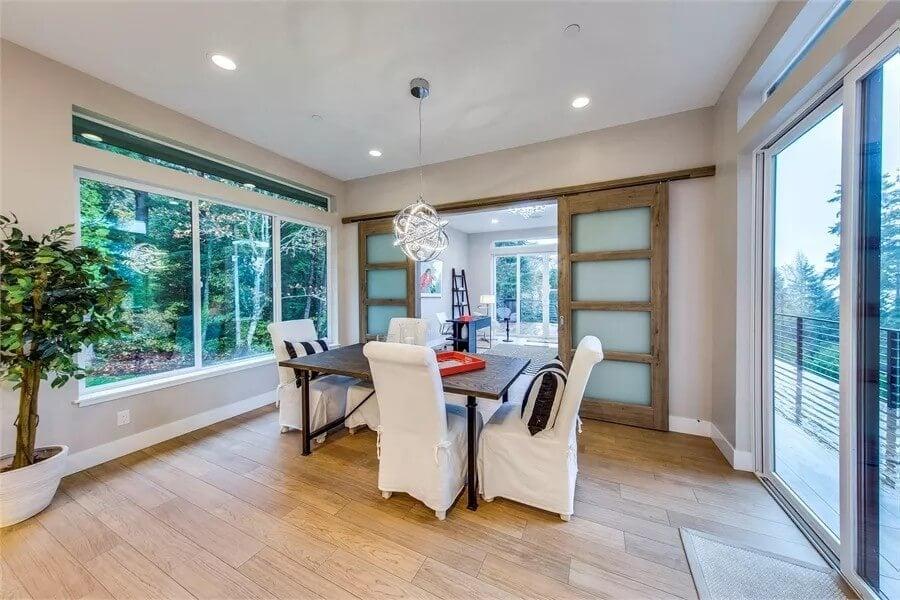 Slide Open These Frosted Glass Doors for a Seamless Indoor-Outdoor Dining Experience