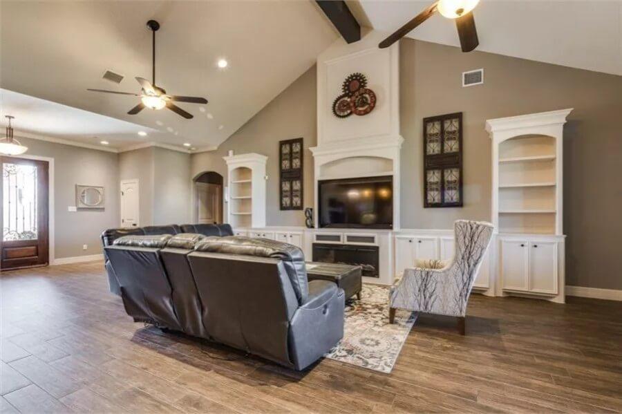 Spacious Living Room Featuring a Striking Built-In Entertainment Center
