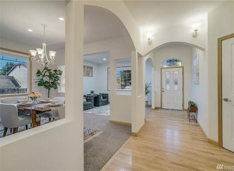 Open-Concept Living with Soft Arched Doorways that Create Flow
