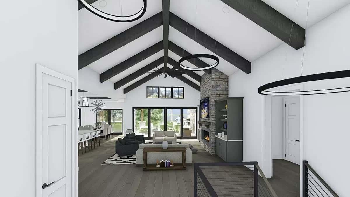 Vaulted Ceilings and Stone Fireplace Create a Striking Living Room