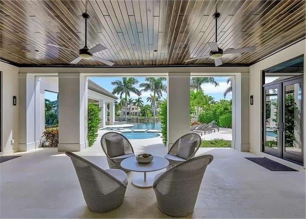 Relax on This Covered Lanai with Stunning Pool Views