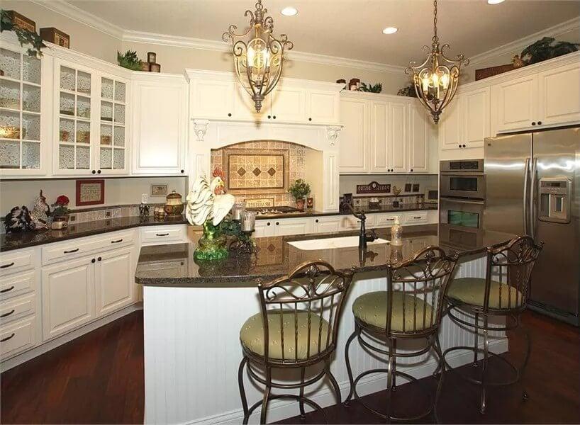 Check Out the Elegant Pendant Lighting Over This Quaint Kitchen Island