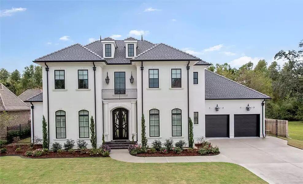 Classic Two-Story Facade with Symmetrical Windows and Updated Roof Line