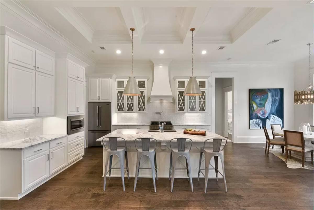 Industrial Pendant Lights Add Flair to this Open-Concept Kitchen
