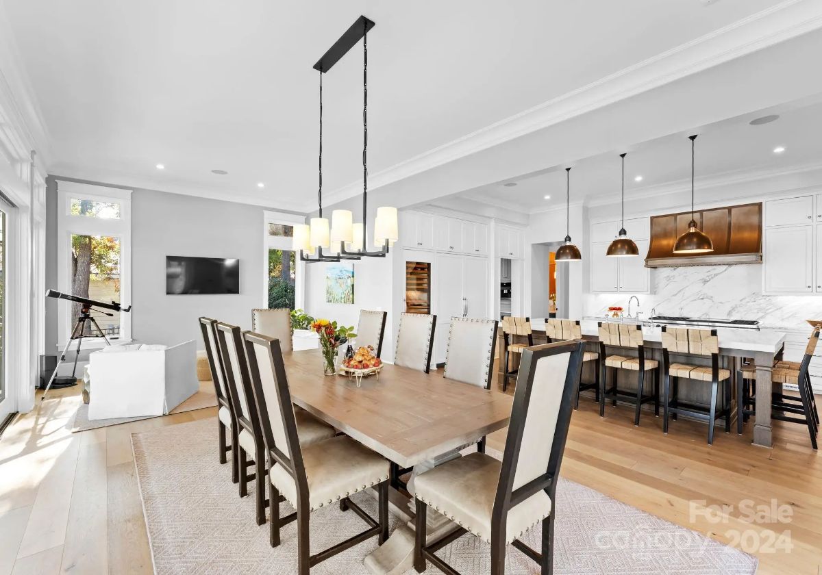 Open dining area connects seamlessly to the kitchen and living room, creating a perfect entertaining space. 