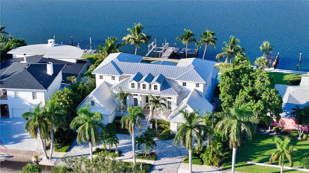 Expansive dock in the back, ideal for boating or relaxing by the water.