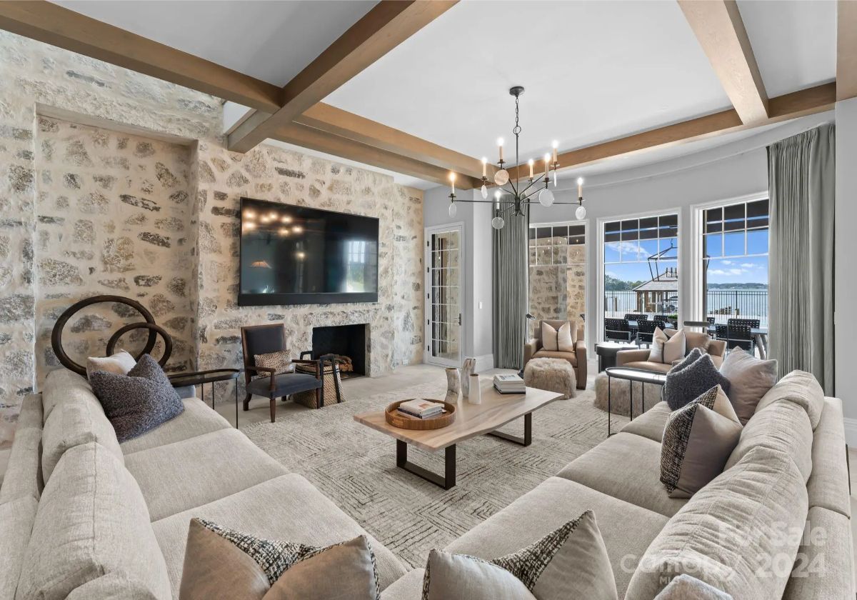  Plush seating and warm textures invite relaxation in a lounge that blends modern and classic charm. 