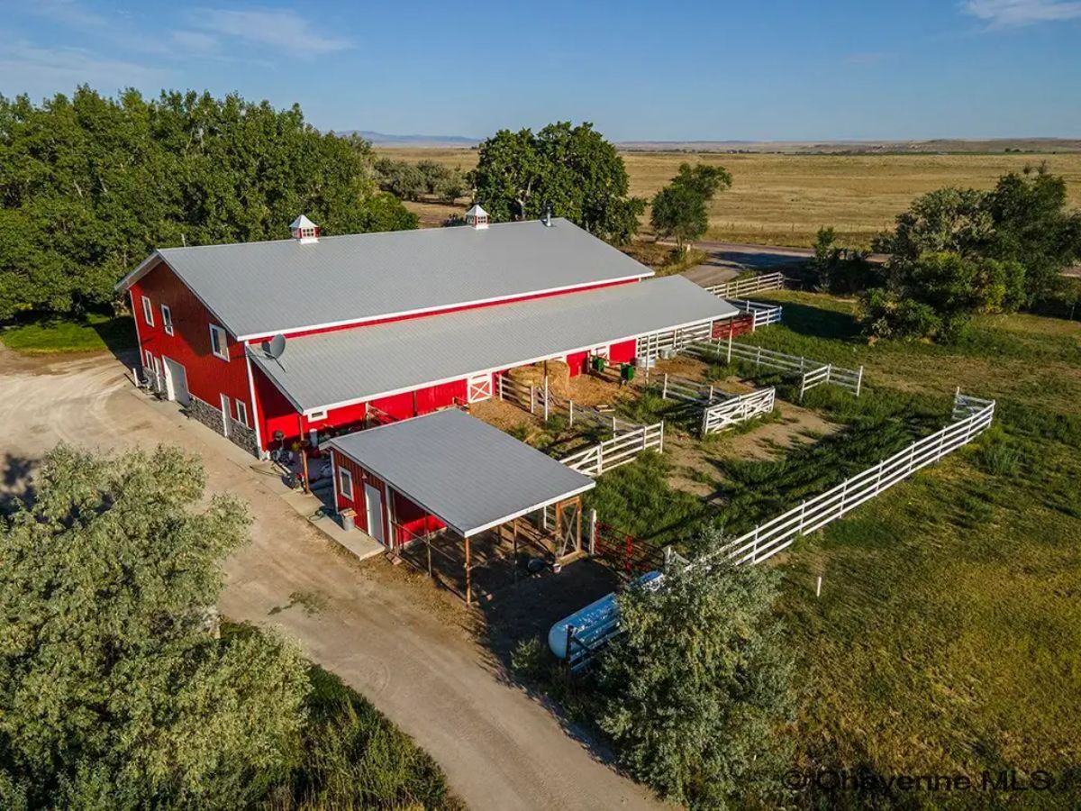 This stunning $935,000 estate, featuring 4 beds, 4 baths, and 3,328 sq. ft., blends modern country living with sustainability just a short, paved drive from town.