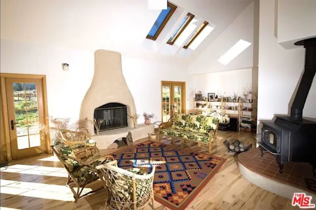 Tall sloped ceilings with multiple skylights bring in ample daylight.
