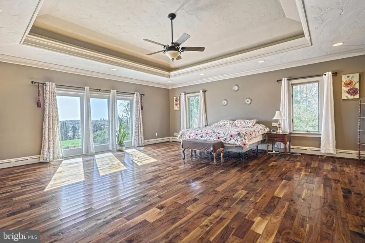 Wood flooring spans across the room.