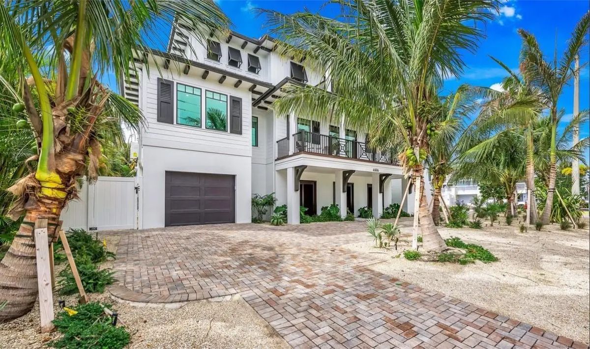 For $10,000,000, here’s what you get in Holmes Beach. Built in 2022, this fully furnished coastal contemporary retreat features 9 ensuite bedrooms, 11 bathrooms,