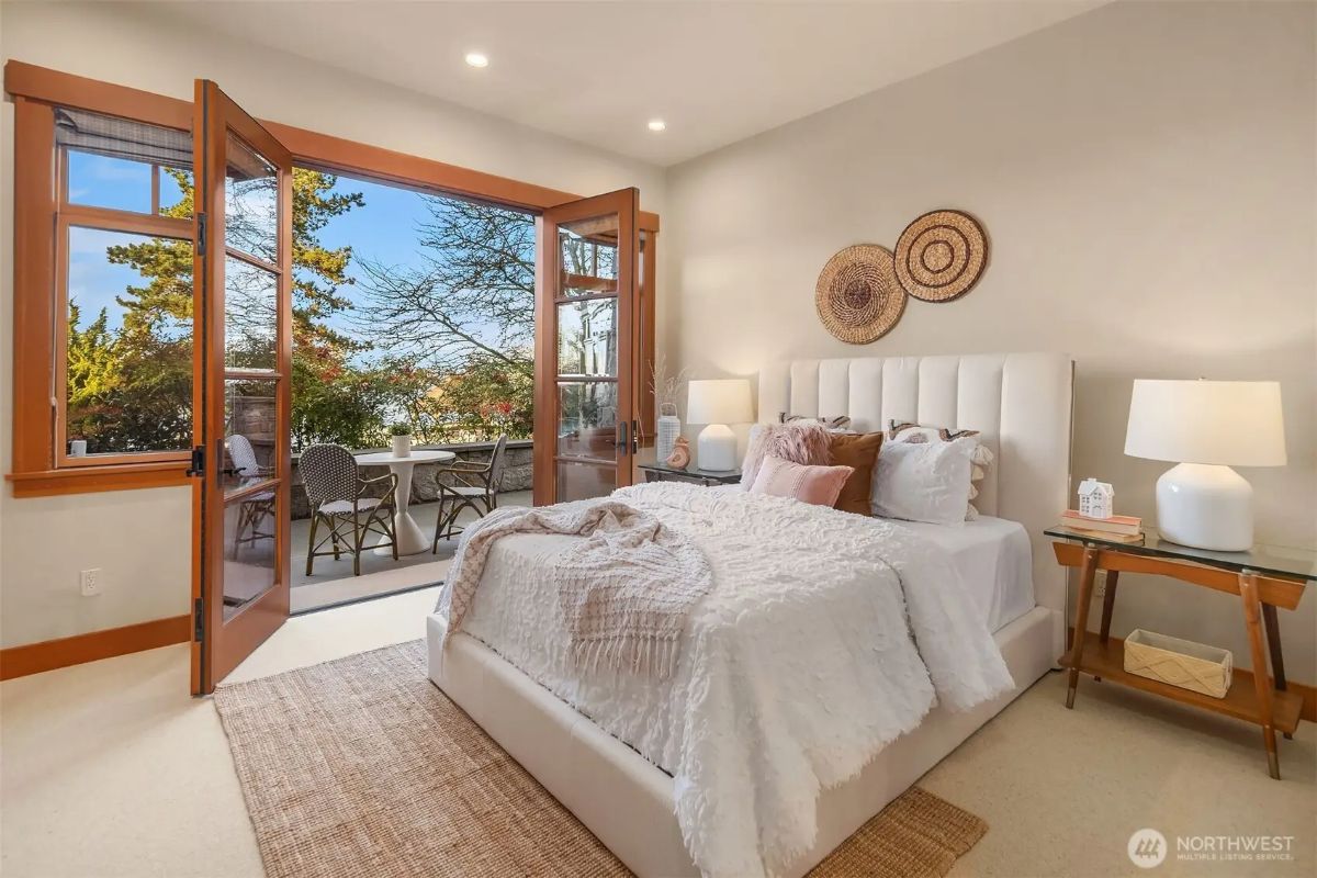 Light-filled bedroom opening to a private outdoor patio, perfect for morning coffee or evening relaxation. 
