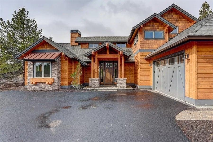 Craftsman Home with Bold Timber and Stone Detailing