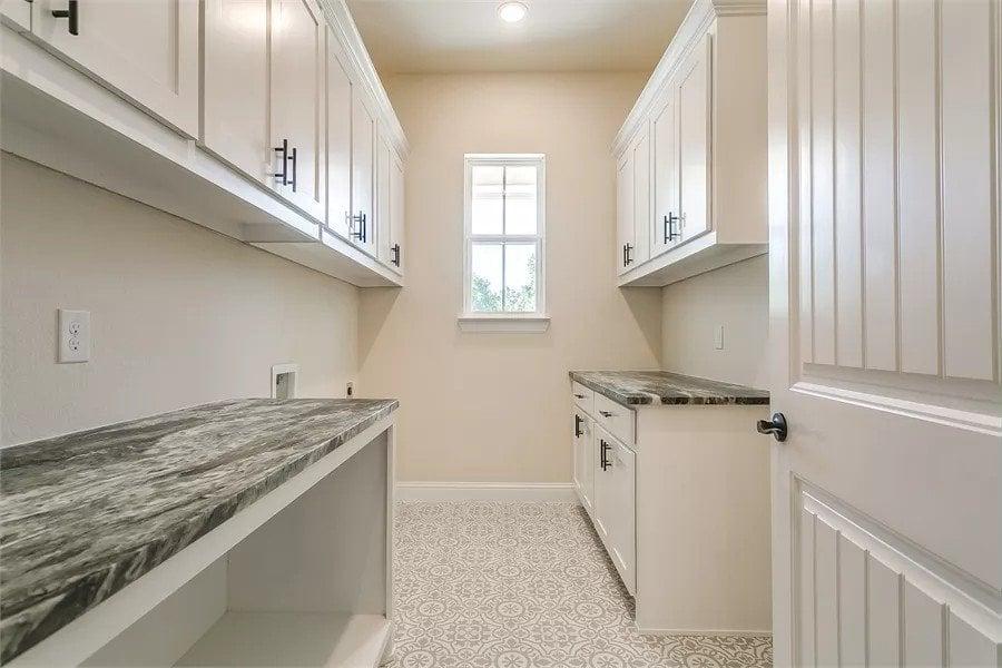 Discover the Unique Patterned Tile in This Functional Laundry Room