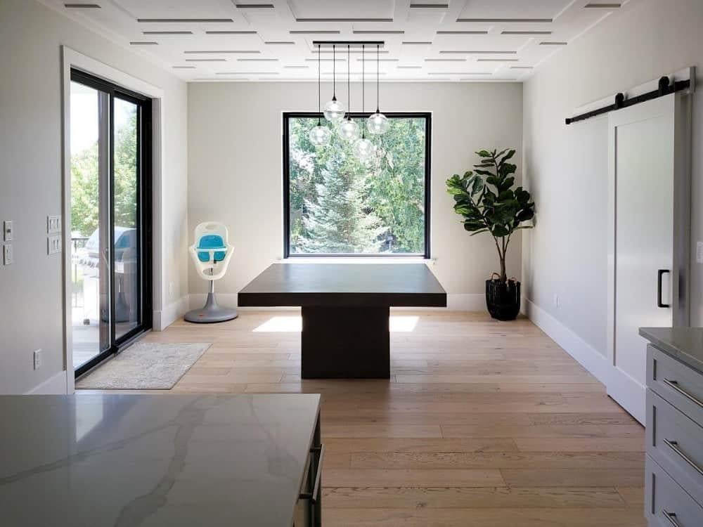 Wow, Look at the Geometric Ceiling in This Modern Dining Area
