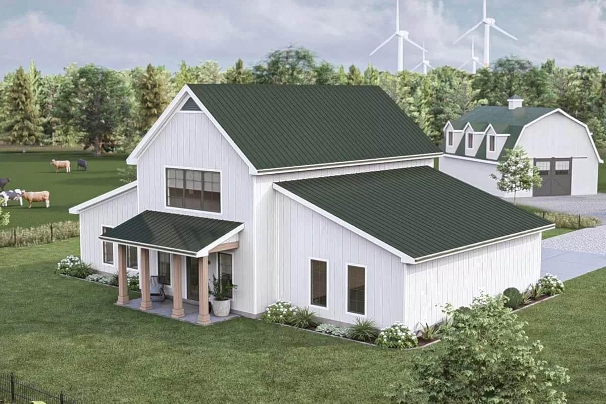 Admire the Expansive Front Lawn of This Farmhouse with Green Metal Roof