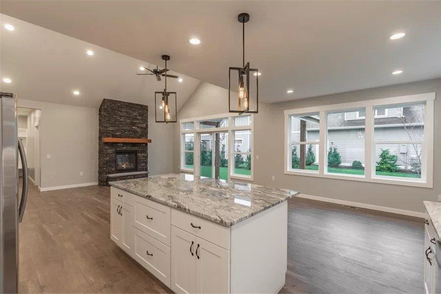 Wow, Look at the Granite Countertops in This Spacious Kitchen