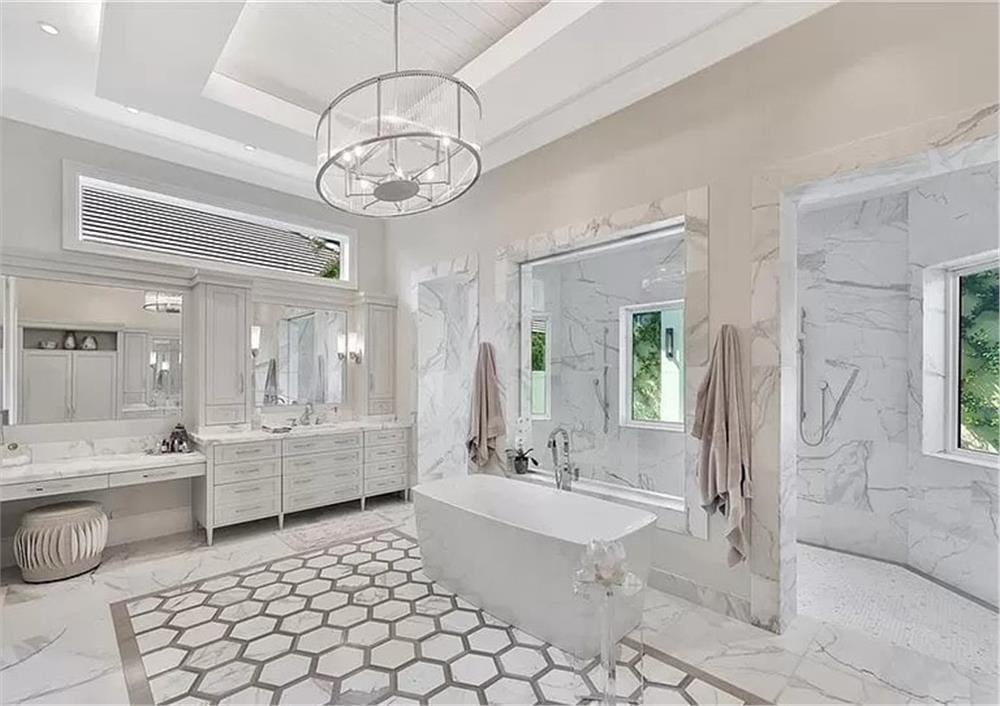 Step Into This Luxurious Bathroom With a Central Freestanding Tub