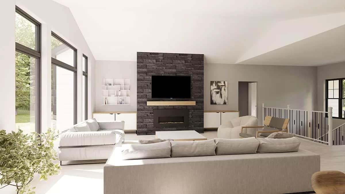 Modern Living Room with Striking Stone Fireplace and Sunlit Ambiance