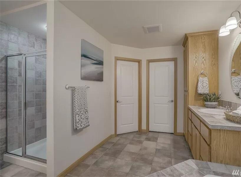 Dual Vanity Bathroom with Warm Wood Accents