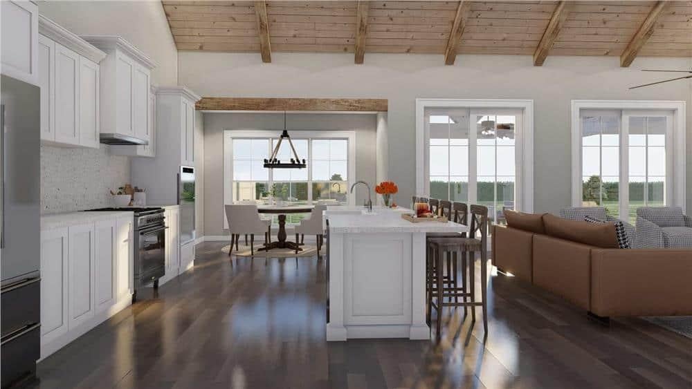 Vaulted Wooden Ceilings in an Open-Concept Living Area with a Central Island