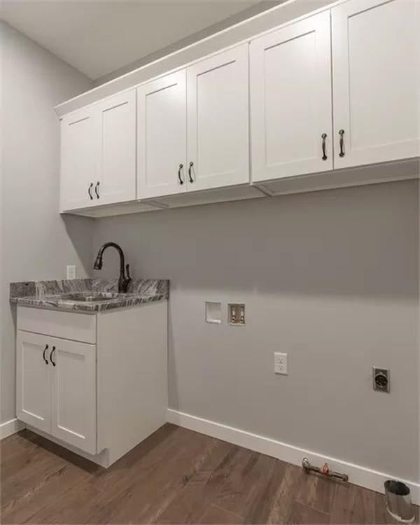Notice the Marble Countertop Adding Flair to This Minimalist Laundry Room
