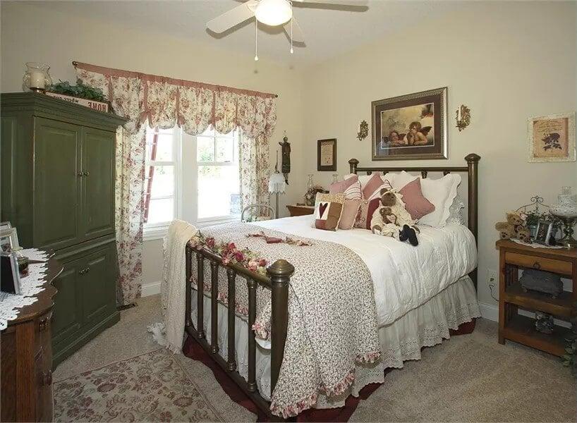 Charming Vintage Bedroom with Floral Accents and Cozy Details