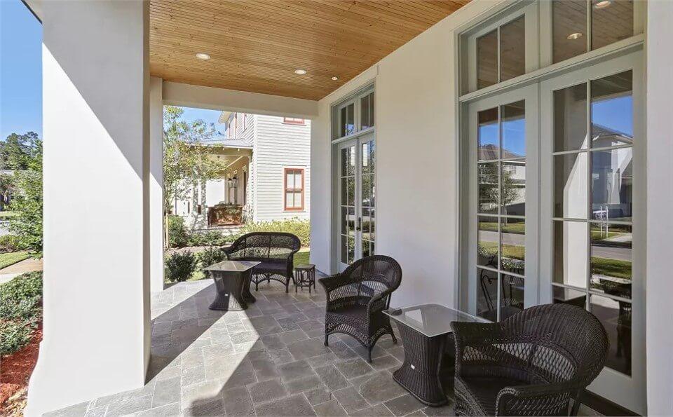 Check Out This Elegant Porch with Sleek Wicker Seating