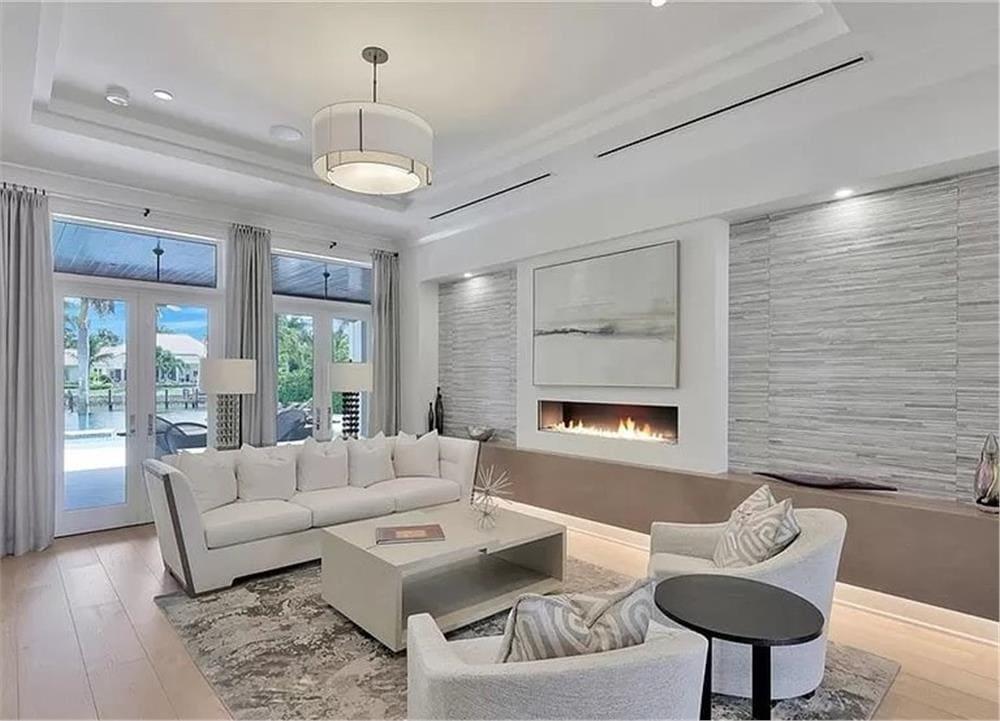 Check Out the Sleek, Modern Fireplace in This Elegant Living Space