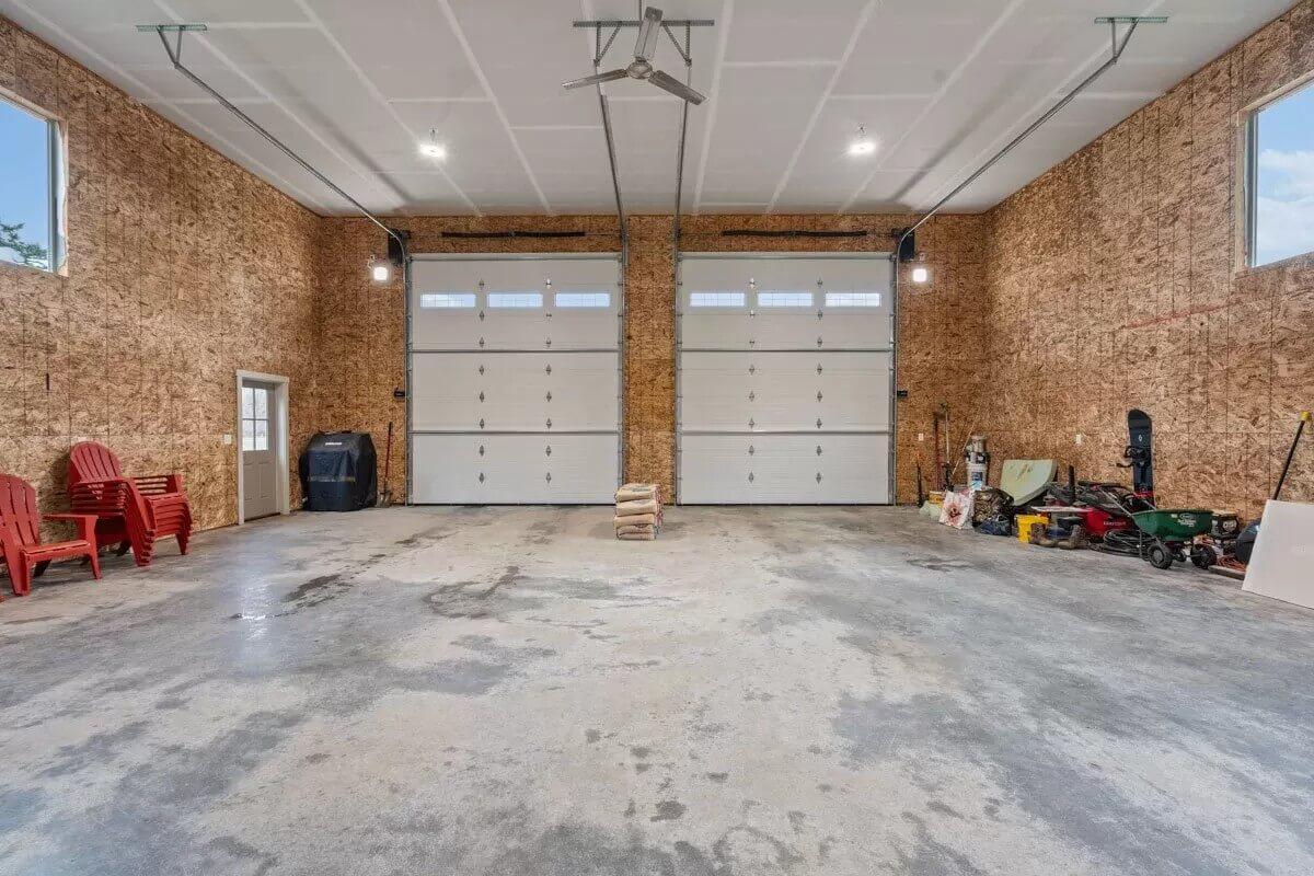 Spacious Garage with Dual Automatic Doors and Practical Layout