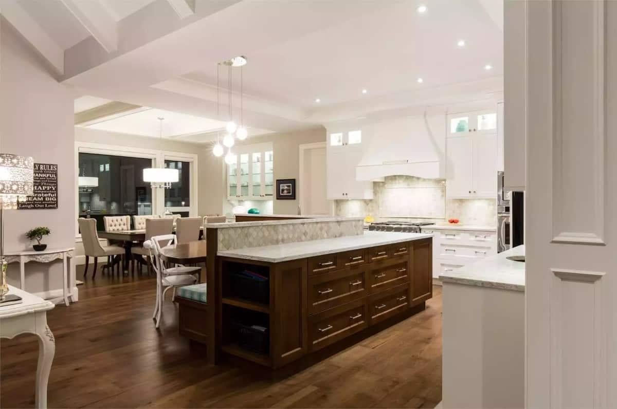 Appreciate the Dual-Tone Island in This Elegant Kitchen