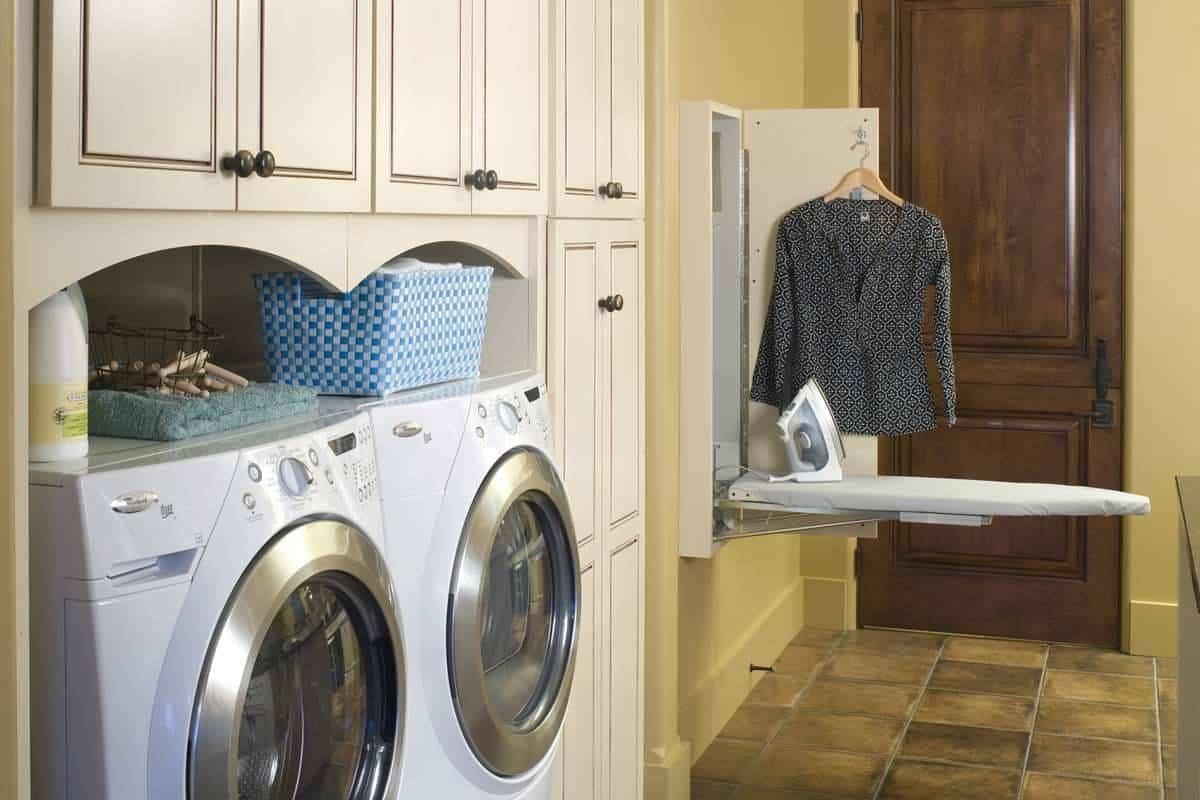 Look at This Space-Saving Fold-Out Ironing Board in the Laundry Room