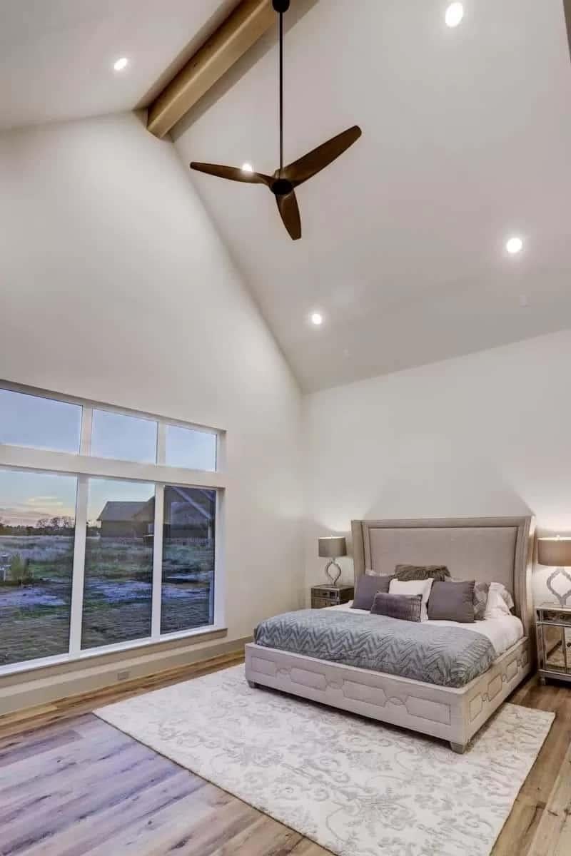 Tranquil Bedroom with Vaulted Ceilings and Warm Wood Accents