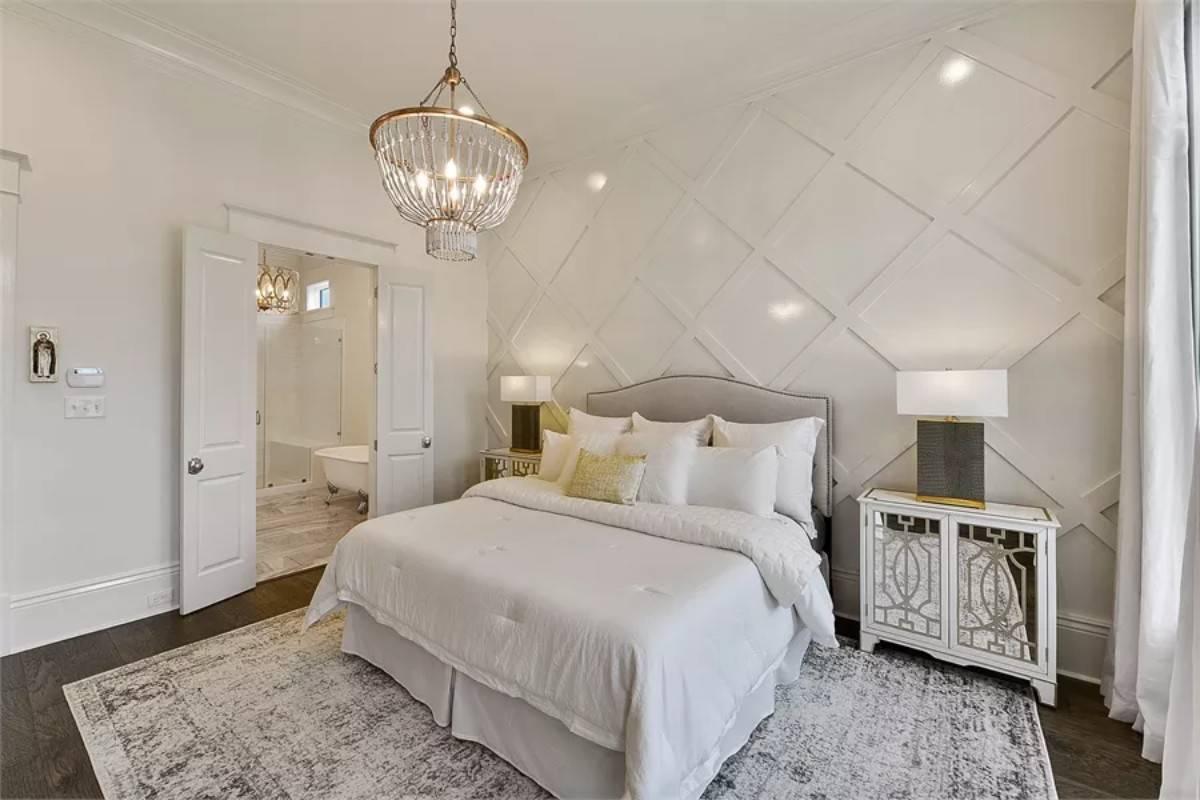 Intricate Geometric Paneling Sets This Bedroom Apart