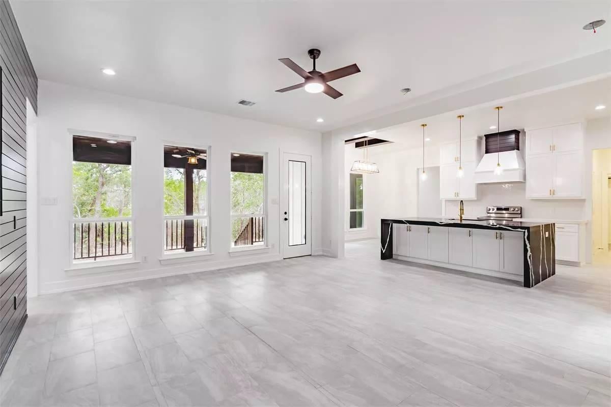Check Out the Contrast of Dark Accents in This Open Living Space